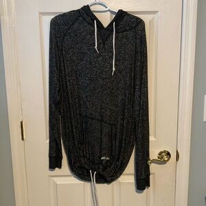 Pink Size Large black hoodie with drawstring at bottom.